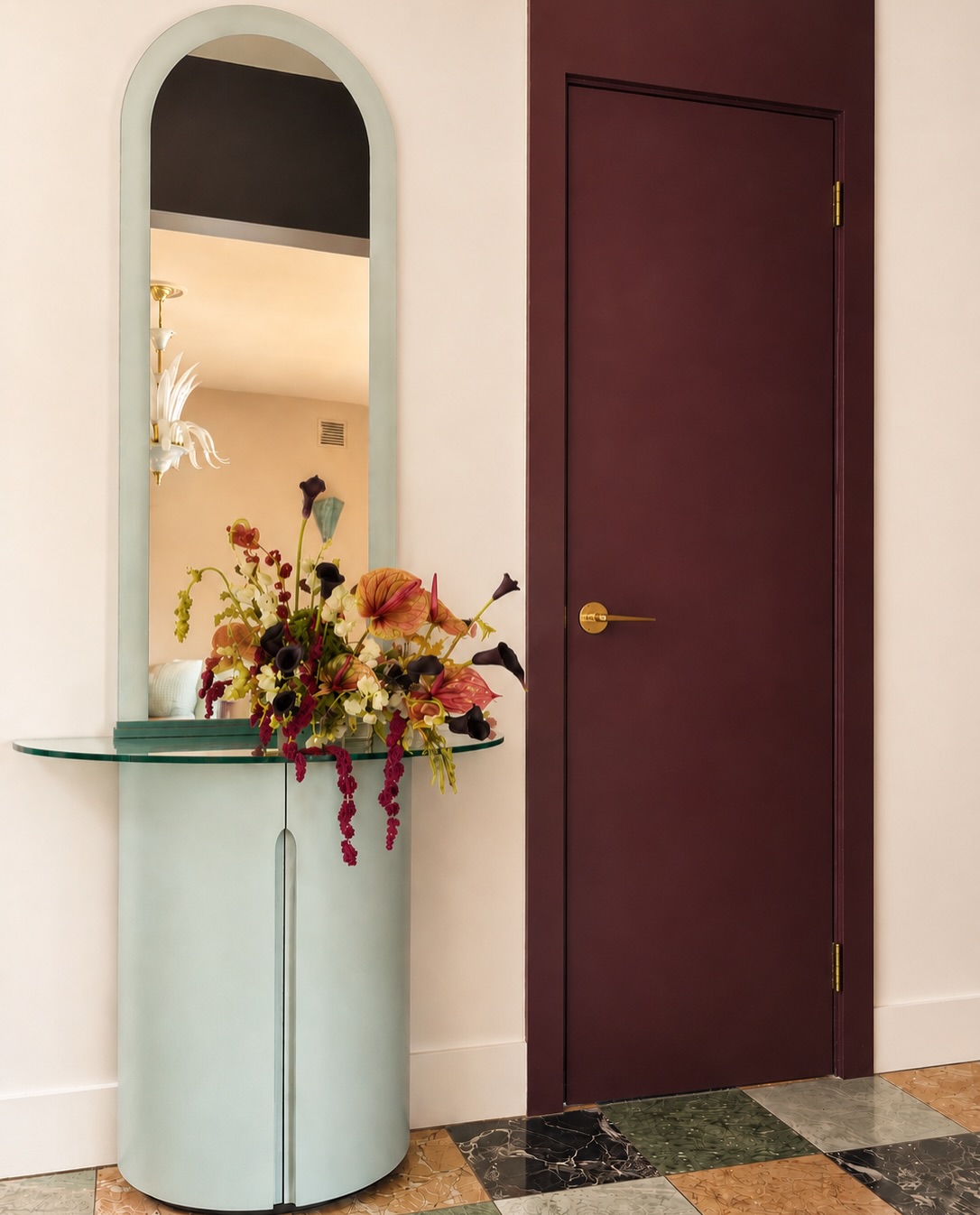 A sage-green entry vestibule in Cedarhurst